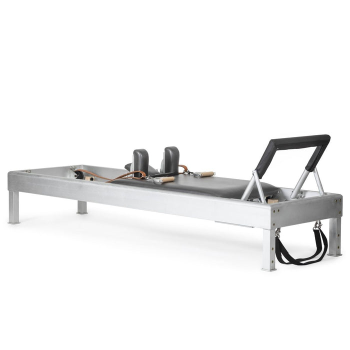 Elina Pilates Classic aluminum reformer with grey upholstery, brown leather pulley straps and wooden handles, shown without a tower.