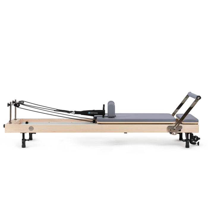 Home Pilates reformer with jump board and box