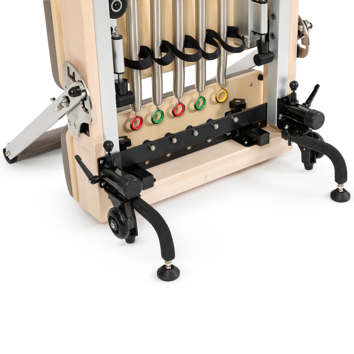 Gray upholstered vertical reformer with aluminum frame

