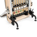 Gray upholstered vertical reformer with aluminum frame


