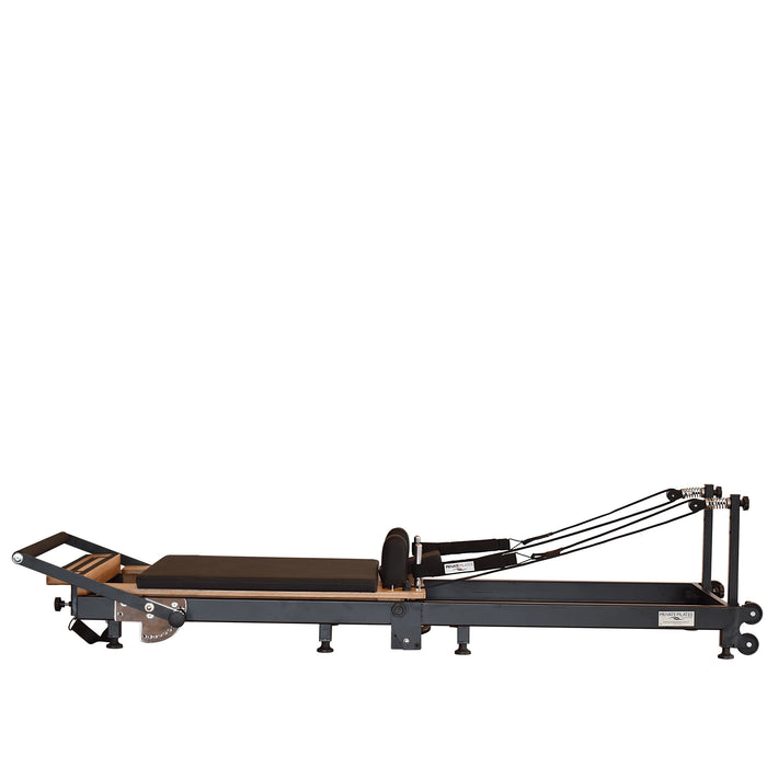 Portable Pilates reformer with adjustable footbar and ergonomic carriage