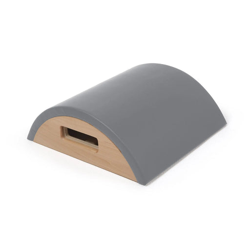 Elina Pilates Arc - side view showing curved profile and padded surface for comfort