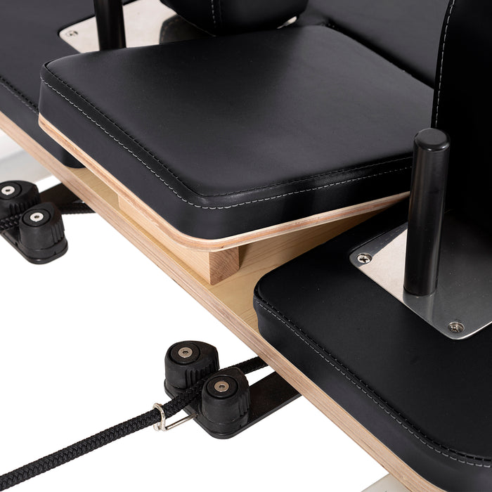 Elina Pilates Lignum Reformer Bundle - detail view of shoulder rest pads and headrest on wood reformer
