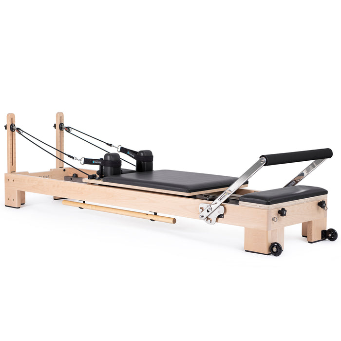 Elina Pilates Lignum Reformer Bundle - close-up detail of wood grain texture and spring tension system