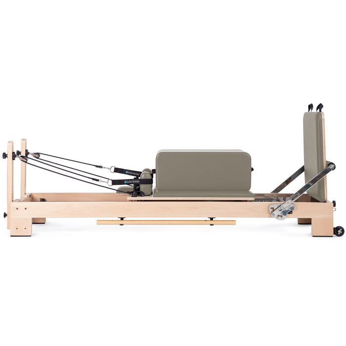 Elina Pilates Lignum Reformer Bundle - angled view highlighting solid wood frame and carriage system