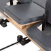 Elina Pilates Lignum Reformer with Tower - close-up detail of natural wood grain and reformer carriage