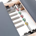 Elina Pilates Lignum Reformer with Tower - in-use shot demonstrating Pilates exercise on lignum reformer