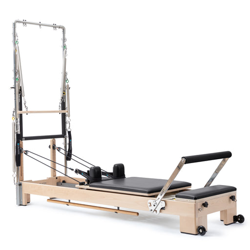 Elina Pilates Lignum Reformer with Tower - front view of wood grain lignum reformer with tower system