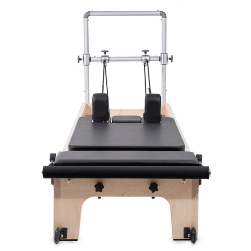 Elina Pilates Master Instructor Reformer Bundle - side view of professional reformer frame with spring system and footbar