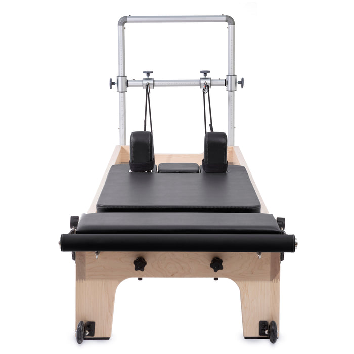 Elina Pilates Master Instructor Reformer Bundle - side view of professional reformer frame with spring system and footbar