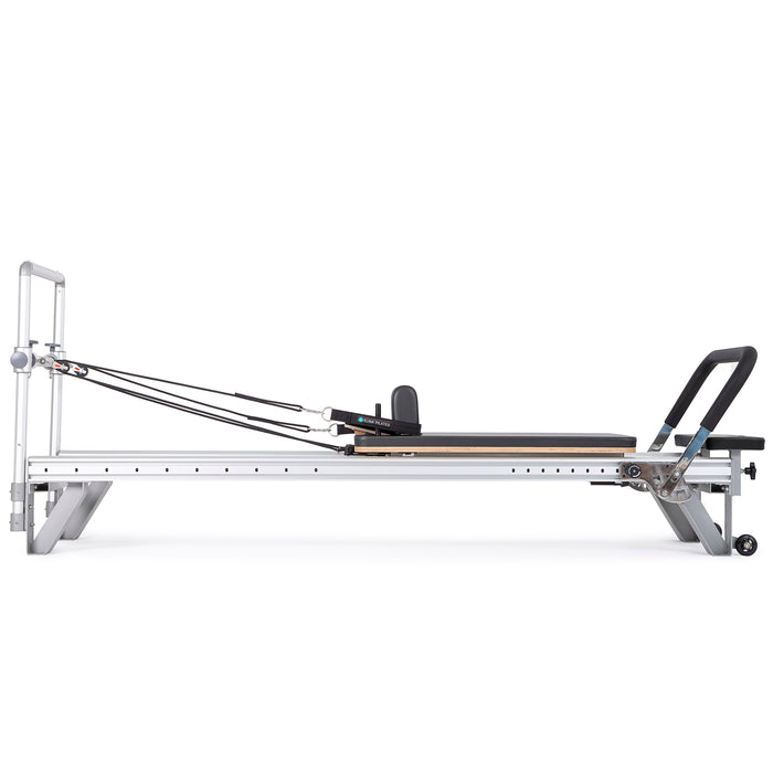 Elina Pilates Mentor Reformer Bundle - side view showing footbar adjustments and spring resistance system