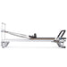 Elina Pilates Mentor Reformer Bundle - side view showing footbar adjustments and spring resistance system