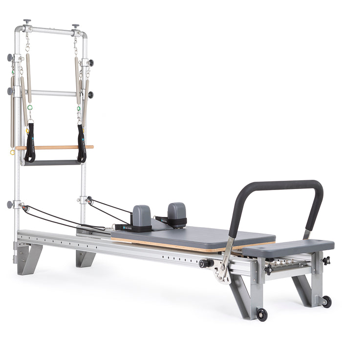 Elina Pilates Mentor Reformer With Tower - angled view highlighting tower attachment and pull-down bars