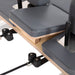 Elina Pilates Nubium Reformer Bundle - second in-use shot showing upper body exercise on nubium reformer