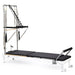 Elina Pilates Nubium Reformer with Tower Bundle - angled view showing tower attachment and reformer carriage