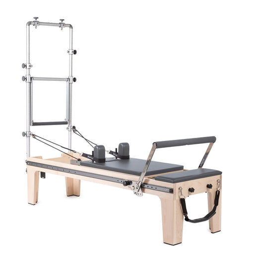 Elina Pilates Master Instructor Fisio Reformer with Tower - side view showing tower height and clinical reformer carriage