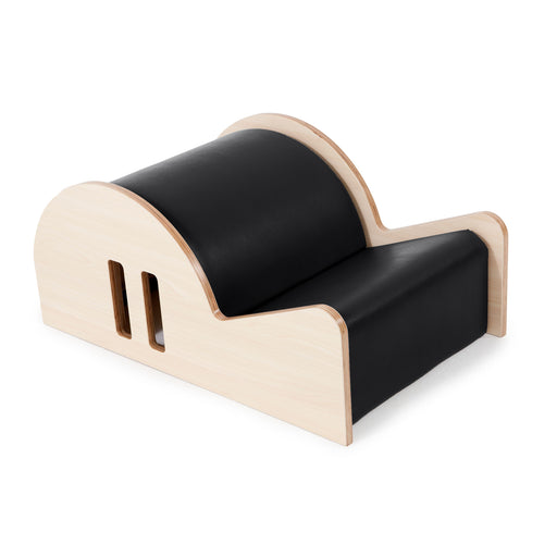Elina Pilates Spine Corrector Elite - front view showing premium arc barrel with upholstered padding and sturdy base