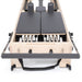 Elina Pilates Twin Reformer - two clients exercising simultaneously in Pilates studio setting