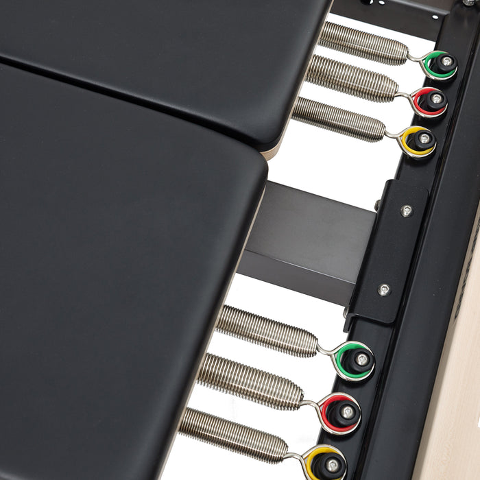 Elina Pilates Twin Reformer - rear view showing adjustable headrests and shoulder pad configuration
