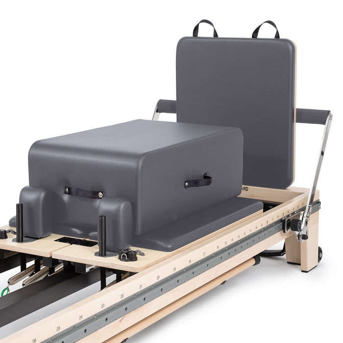 Elina Pilates Twin Reformer - detail view of frame legs, wheels, and floor protection pads