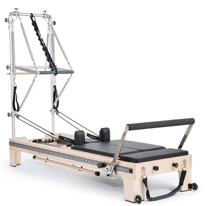 Elina Pilates Twin Reformer - close-up of center divider and independent spring tension controls