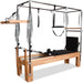 Full Pilates Cadillac Reformer with trapeze, push-through bar, and springs

