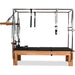 Close-up of Cadillac Reformer footbar and carriage system

