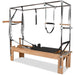 Full Pilates Cadillac Reformer with trapeze, push-through bar, and springs

