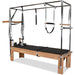Full Pilates Cadillac Reformer with trapeze, push-through bar, and springs

