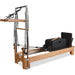Studio-grade Pilates equipment with push-through bar and jump board