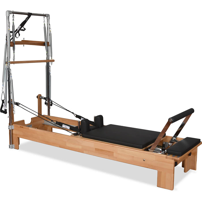 Pilates reformer with tower springs, footbar, and orthopedic sitting box