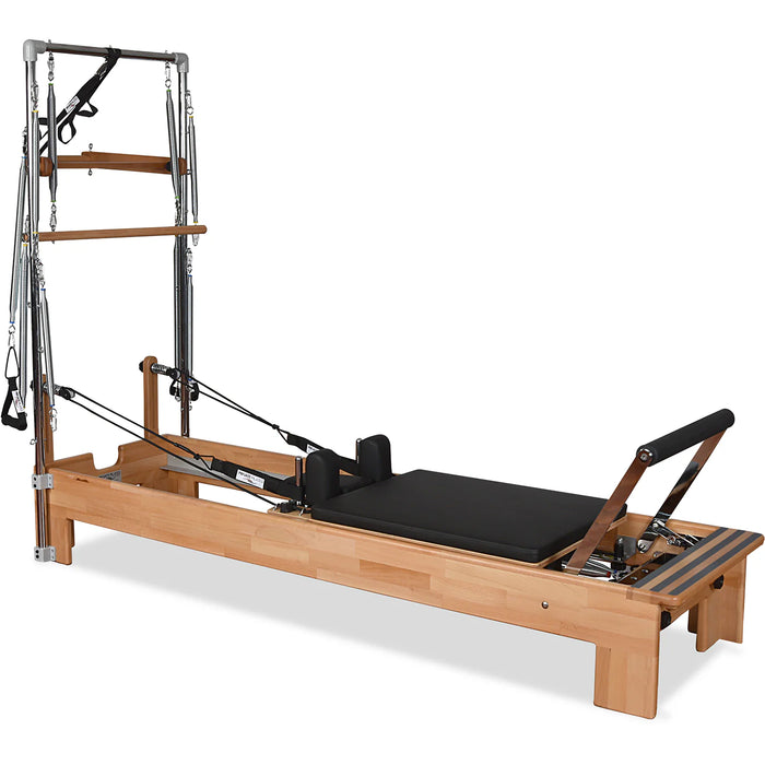 Pilates reformer with tower springs, footbar, and orthopedic sitting box