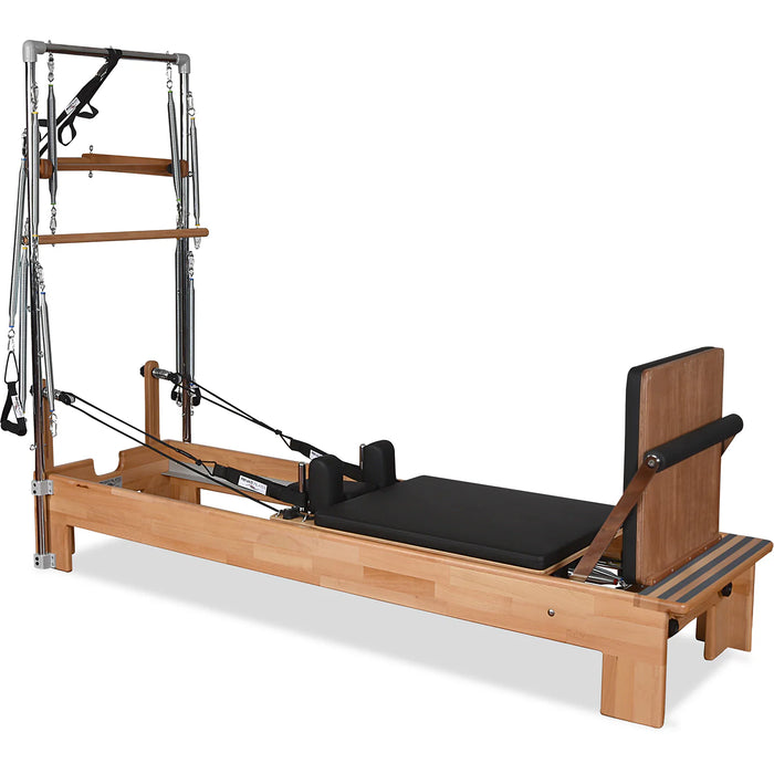 Pilates reformer with tower springs, footbar, and orthopedic sitting box