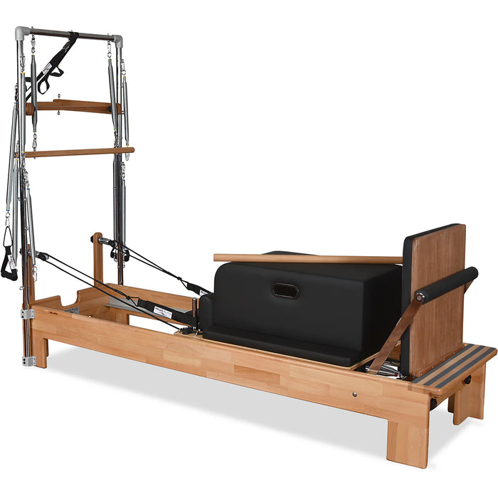 Pilates reformer with tower springs, footbar, and orthopedic sitting box