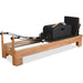 Studio-grade Pilates reformer with ergonomic carriage and footbar

