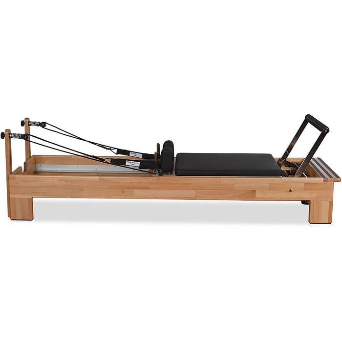 Studio-grade Pilates reformer with ergonomic carriage and footbar

