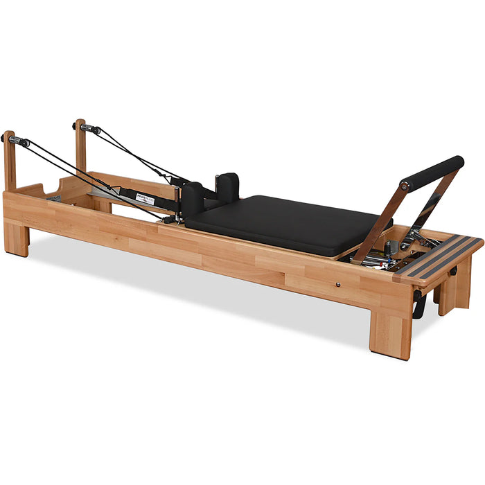 Beechwood Pilates reformer with chrome components and padded platform

