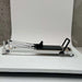 The Core Collab Queen 2.0 Studio Pilates Reformer - detail of resistance springs and color-coded spring bar