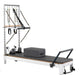 The Core Collab Queen Pilates Tower - full view showing tower attachment with push-through bar and spring system