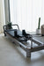 TCC Queen Foldable Pilates Reformer - full view showing foldable frame design with carriage and resistance system