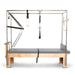 Elina Pilates Cadillac Reformer product view shown for Aged Rose and Eucalyptus selections; upholstery color shown by swatch