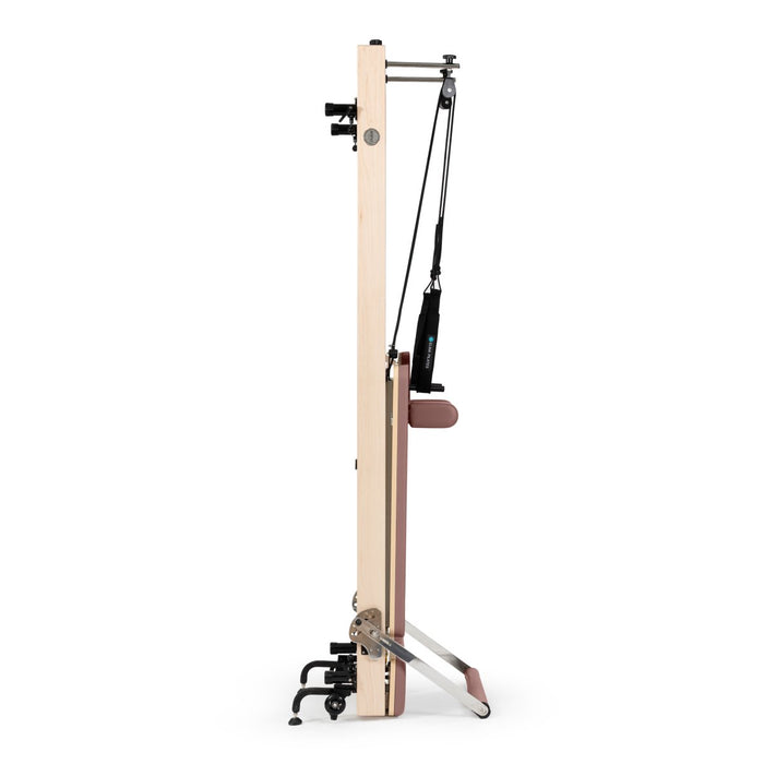 Elina Pilates Vertical Reformer for Home in Aged Rose upholstery, upright storage view
